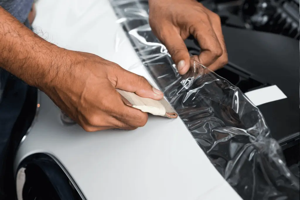 paint protection film being applied